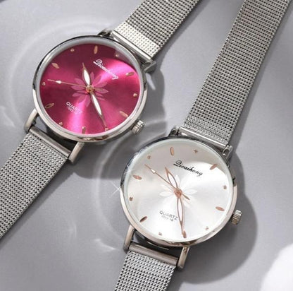 Women's Stylish Elegant Watch With Braided Steel Bracelet With Shiny Background Unique Design Perfect Gif